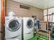 Washer and dryer hookups in the utility room, featuring ample natural light at 1005 Richard Dr, The Villages, FL 32159