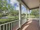 Charming front porch with brick flooring offers a welcoming entrance at 101 Flame Vine Way, Groveland, FL 34736