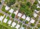 Bird's eye view of homes with well-maintained lawns and landscaping, in a peaceful neighborhood at 1156 Capella Dr, Tavares, FL 32778