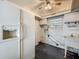 Functional laundry room with utility sink, and ceiling fan at 1156 Capella Dr, Tavares, FL 32778