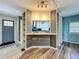 Stylish living area featuring a breakfast bar with updated cabinets and countertops at 1156 Capella Dr, Tavares, FL 32778