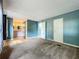 Main bedroom showing an open bathroom and walk-in closet at 1156 Capella Dr, Tavares, FL 32778