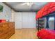 bedroom with a bunk bed and wood laminate flooring at 11750 Watts Ct, Tavares, FL 32778