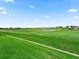 Enjoy the golf course view from your backyard, offering a serene and picturesque setting at 12198 Se 176Th Loop, Summerfield, FL 34491