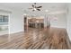 Bright, open living space with tile flooring and access to the screened lanai at 12198 Se 176Th Loop, Summerfield, FL 34491