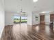 Open-concept living area featuring tile flooring and golf course views at 12198 Se 176Th Loop, Summerfield, FL 34491