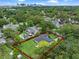 Aerial shot of a house with city skyline in the background, outlined in red at 1237 Mercedes Pl, Orlando, FL 32804
