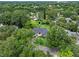Bird's eye view of house with pin, surrounded by trees and neighborhood at 1237 Mercedes Pl, Orlando, FL 32804