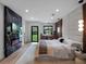Spacious bedroom featuring a decorative fireplace and backyard views at 1237 Mercedes Pl, Orlando, FL 32804