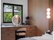 Bright bedroom featuring vanity with storage, modern lighting, and stylish decor at 1237 Mercedes Pl, Orlando, FL 32804