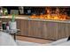 Close-up of a modern fireplace featuring a sleek design and cabinets below at 1237 Mercedes Pl, Orlando, FL 32804