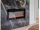 Modern electric fireplace with marble surround at 1237 Mercedes Pl, Orlando, FL 32804