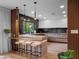 Modern kitchen with sleek countertops, stainless steel appliances, and breakfast bar at 1237 Mercedes Pl, Orlando, FL 32804