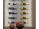 Close up of a wine rack with multiple bottles of wine at 1237 Mercedes Pl, Orlando, FL 32804
