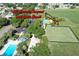 Aerial view of the Rio Grande Croquet and Lawn Bowls surrounded by greenery at 1325 Balboa Ct, The Villages, FL 32159