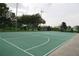 Community basketball court providing space for sports and recreation at 1355 Misty Glen Ln, Clermont, FL 34711