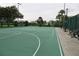 Enjoy the community basketball court with benches and a smooth surface at 1355 Misty Glen Ln, Clermont, FL 34711