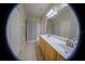 Bright bathroom with double sinks and tile flooring at 1355 Misty Glen Ln, Clermont, FL 34711