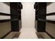 Walk-in closet with custom shelving and drawers, offering ample storage space at 1355 Misty Glen Ln, Clermont, FL 34711