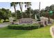 Elegant entrance sign for Legends Golf & Country Club, surrounded by lush greenery at 1355 Misty Glen Ln, Clermont, FL 34711