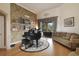 Cozy living room with a grand piano and comfortable seating, perfect for entertaining or relaxation at 1426 Lakemist Ln, Clermont, FL 34711