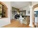 Spacious living room with a piano, comfortable seating, and lots of natural light at 1426 Lakemist Ln, Clermont, FL 34711