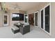 Outdoor patio featuring comfortable seating and seamless access to the indoors at 1426 Lakemist Ln, Clermont, FL 34711