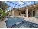Beautiful pool and spa area with covered patio, perfect for outdoor entertaining at 1426 Lakemist Ln, Clermont, FL 34711
