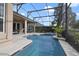 Inviting screened-in pool and spa area, perfect for relaxation and entertaining at 1426 Lakemist Ln, Clermont, FL 34711