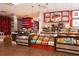 Charming cafe with colorful displays of pastries, snacks, and beverages, inviting guests to indulge at 14501 Grove Resort Ave # 3406, Winter Garden, FL 34787