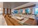 Expansive resort lobby with stylish seating areas and a long bar, creating a welcoming atmosphere at 14501 Grove Resort Ave # 3406, Winter Garden, FL 34787