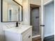 Updated bathroom featuring a new vanity with quartz countertop and a tiled shower at 1611 Canal, Tavares, FL 32778