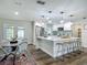 Cozy living room filled with natural light from a large window and modern stylish furniture at 1611 Canal, Tavares, FL 32778