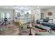 Open layout showcases the kitchen, dining area, and living room, perfect for modern living at 1611 Canal, Tavares, FL 32778