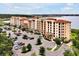 Luxury condos with Mediterranean-style architecture, lush landscaping, and convenient parking at 16300 County Road 455 # 202, Montverde, FL 34756