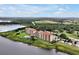 Luxury condos with a pool, gorgeous lake views, and surrounded by lush greenery at 16300 County Road 455 # 202, Montverde, FL 34756