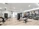 Fully equipped gym with modern cardio and strength-training equipment for a complete workout at 16300 County Road 455 # 202, Montverde, FL 34756