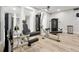Modern gym featuring exercise equipment for a healthy lifestyle at 16300 County Road 455 # 202, Montverde, FL 34756