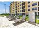 Loungers by the pool provide a relaxing experience at 16300 County Road 455 # 202, Montverde, FL 34756