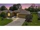 Charming single-Gathering home with paver driveway, mature landscaping, and attached two-car garage at 16862 Se 80Th Bellavista Cir, The Villages, FL 32162