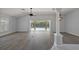 Open concept living space leads to the pool and patio at 16862 Se 80Th Bellavista Cir, The Villages, FL 32162