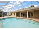 Relaxing screened-in pool area great for entertaining and enjoying sunny days at 16862 Se 80Th Bellavista Cir, The Villages, FL 32162