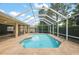Relaxing screened-in pool area great for outdoor entertaining with a covered patio at 16862 Se 80Th Bellavista Cir, The Villages, FL 32162