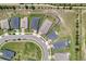 The aerial view highlights the property's location on a cul-de-sac and large backyard at 1696 Wilson Prairie Cir, Groveland, FL 34736