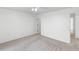 Spacious bedroom features neutral carpet, ample natural light and a ceiling fan at 1726 Tropical Ct, Tavares, FL 32778