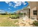 Backyard with a screened-in pool and a patio, offering a private outdoor retreat at 17300 Summer Sun Ct, Clermont, FL 34711