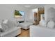 Stylish living room with vaulted ceilings, contemporary furnishings, and elegant decor at 17300 Summer Sun Ct, Clermont, FL 34711