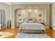 Close-up of the primary bedroom features a decorative rug and stylish furnishings at 18008 Victorian Dr, Clermont, FL 34715