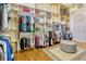 Large walk-in closet features custom shelving and ample storage space for an organized wardrobe at 18008 Victorian Dr, Clermont, FL 34715