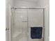 Bathroom shower with sliding glass door and a built-in seat at 1815 Kaufman Cir, Lady Lake, FL 32159